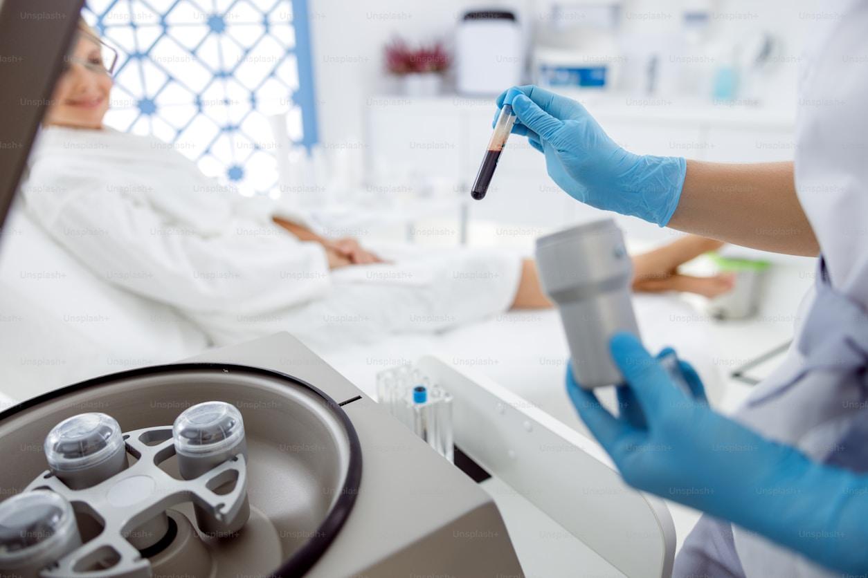 Lab technicians processing patient samples for genomic sequencing